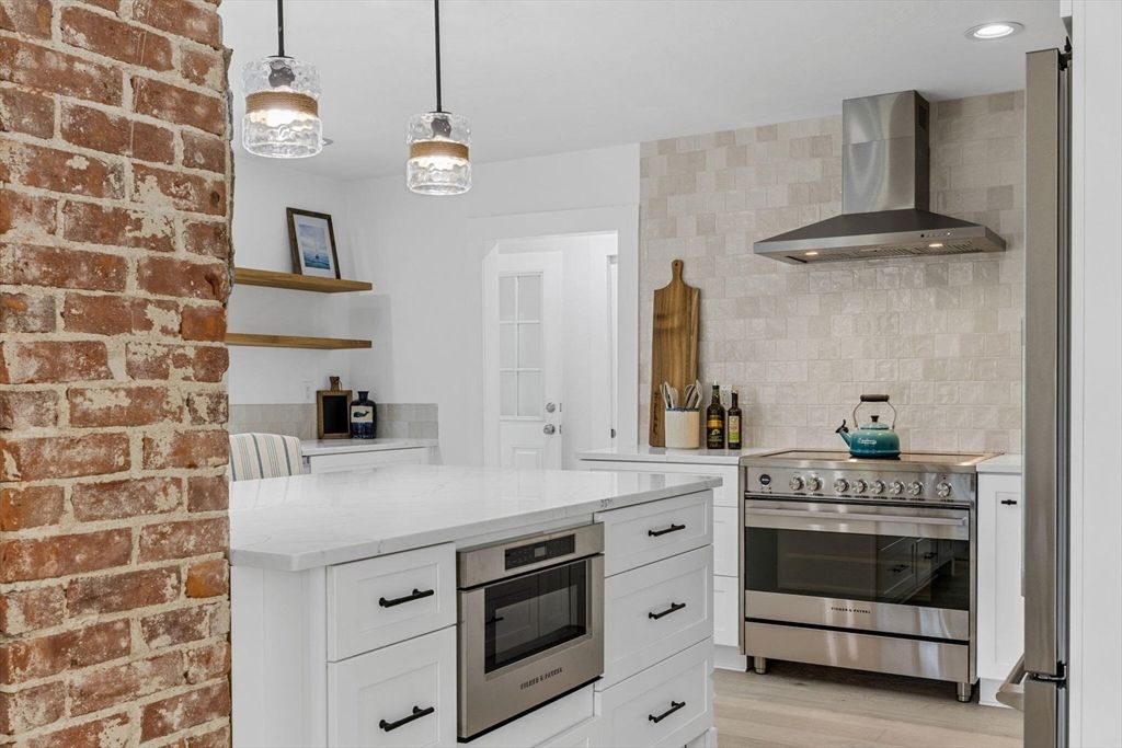 Interior, Kitchen, Pendant Lights, Recessed Lighting, Stainless Steel Appliances, Stone Walls, Wood Texture Flooring