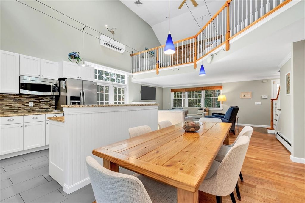 Dining room, Interior, Kitchen, Pendant Lights, Stainless Steel Appliances, Wood Texture Flooring