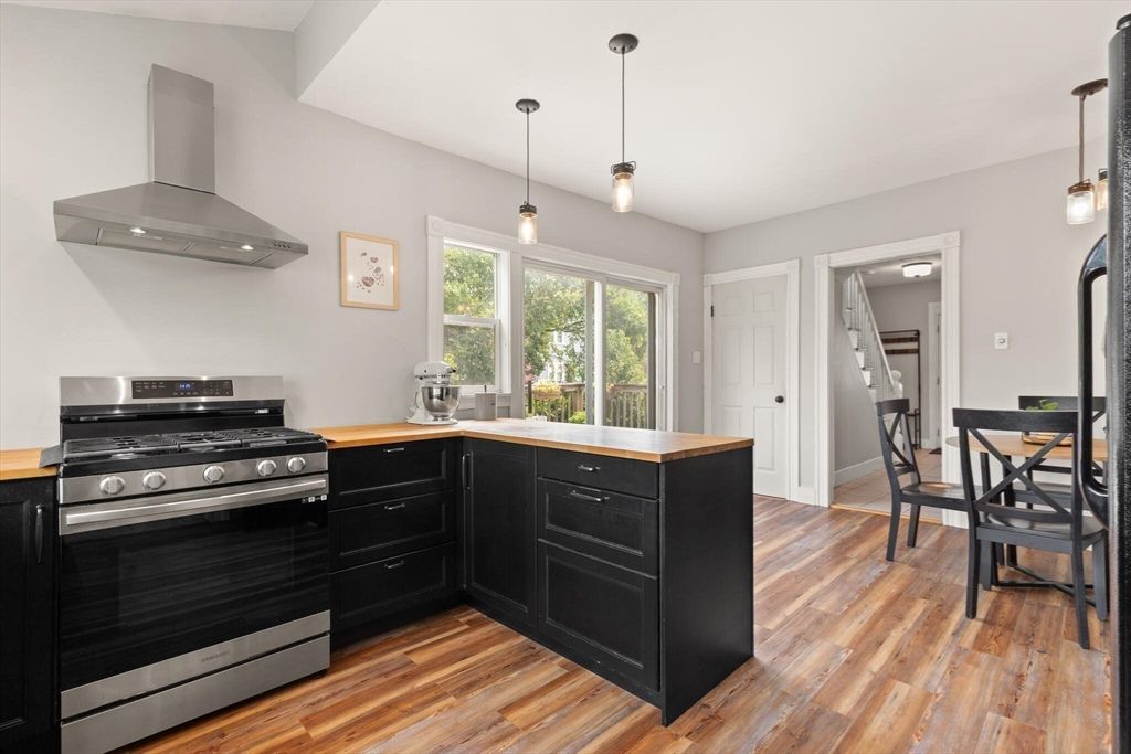 Dining room, Interior, Kitchen, Pendant Lights, Stainless Steel Appliances, Wood Texture Flooring