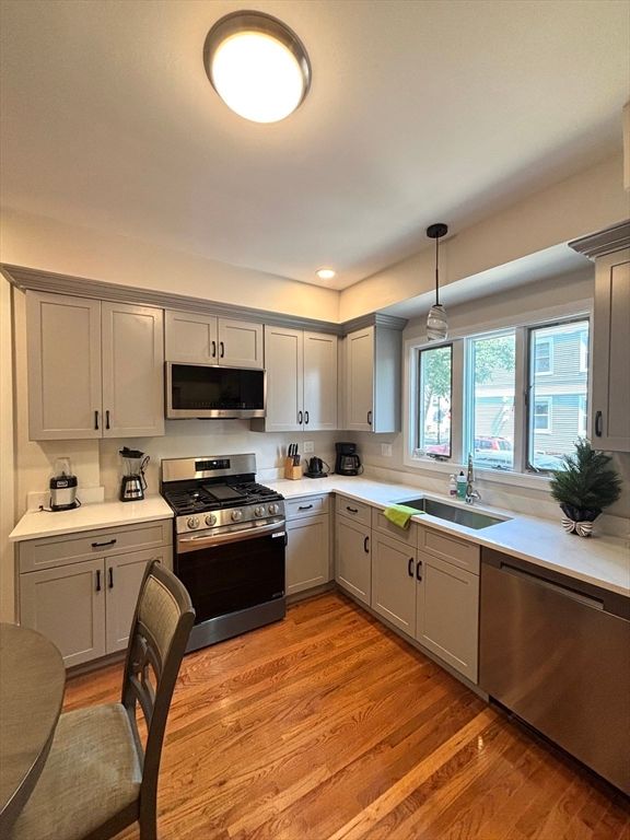 Interior, Kitchen, Pendant Lights, Recessed Lighting, Stainless Steel Appliances, Wood Texture Flooring