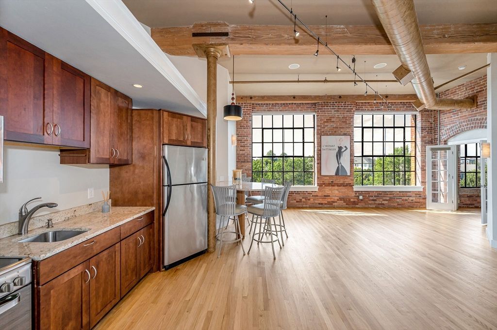 Interior, Kitchen, Pendant Lights, Recessed Lighting, Stainless Steel Appliances, Stone Walls, Wooden Beams, Wood Texture Flooring