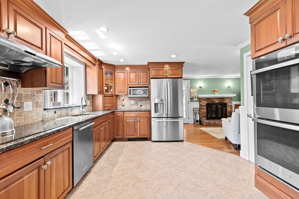 Fireplace, Interior, Kitchen, Living room, Recessed Lighting, Stainless Steel Appliances, Wood Texture Flooring