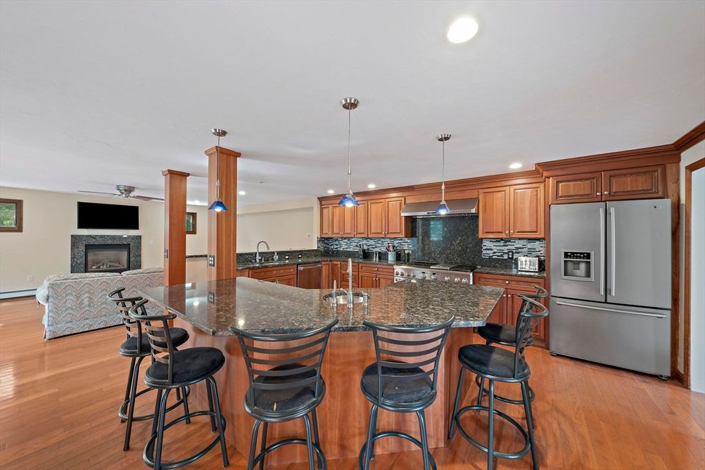 Fireplace, Interior, Kitchen, Pendant Lights, Recessed Lighting, Stainless Steel Appliances, Wood Texture Flooring