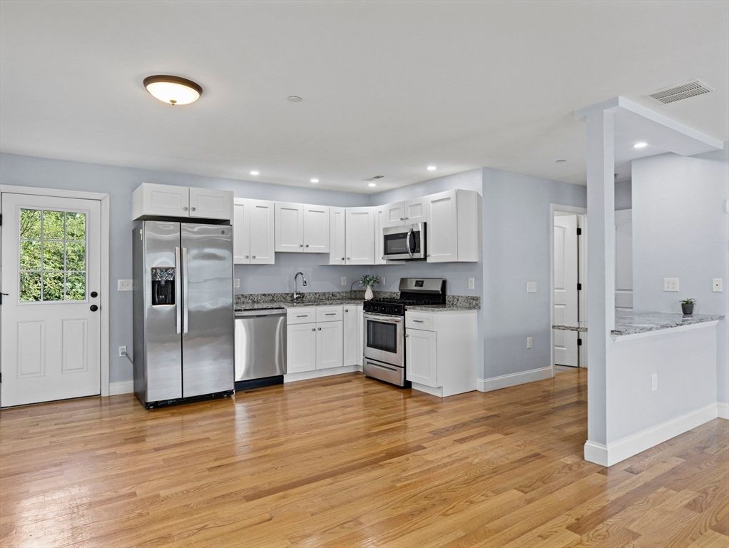 Interior, Kitchen, Recessed Lighting, Stainless Steel Appliances, Wood Texture Flooring