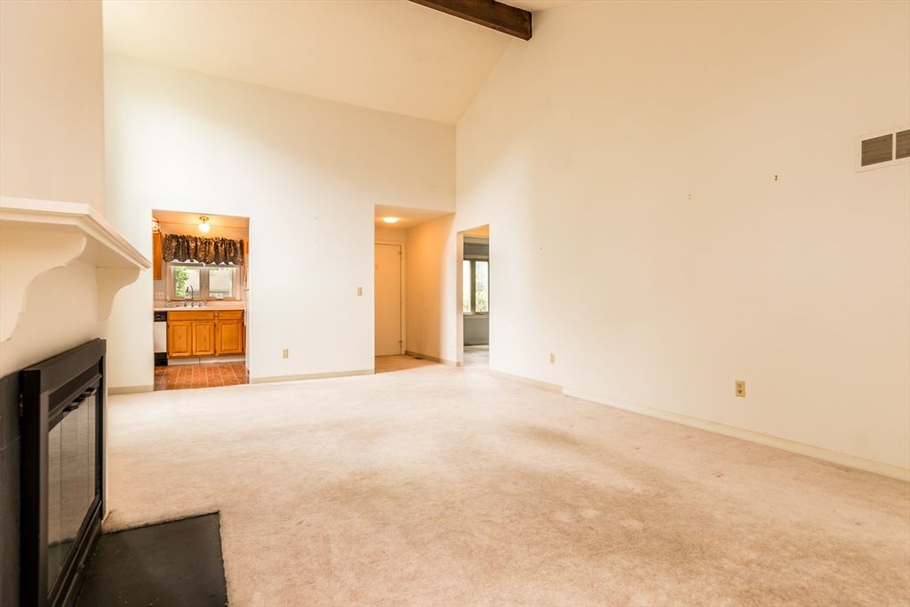 Empty room, Fireplace, Interior, Recessed Lighting, Wooden Beams
