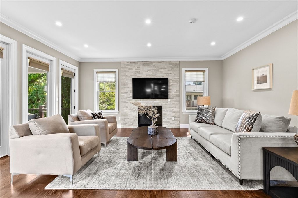 Fireplace, Interior, Living room, Recessed Lighting, Stone Walls, Wood Texture Flooring