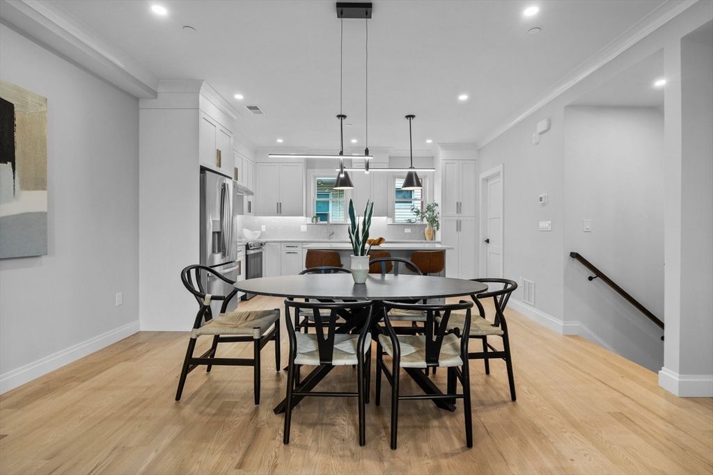 Dining room, Interior, Kitchen, Pendant Lights, Recessed Lighting, Stainless Steel Appliances, Wood Texture Flooring