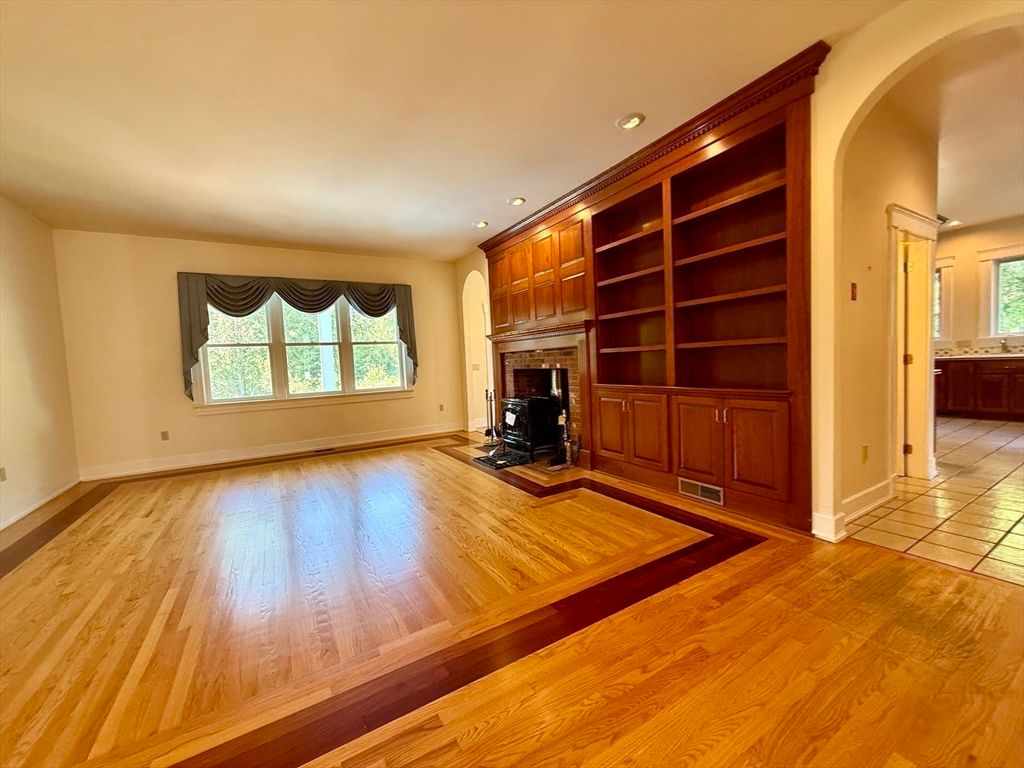 Empty room, Fireplace, Interior, Recessed Lighting, Wood Texture Flooring