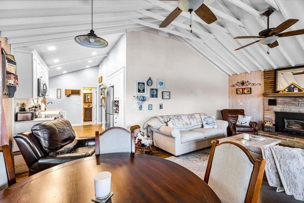 Dining room, Fireplace, Interior, Living room, Pendant Lights, Recessed Lighting, Wood Texture Flooring