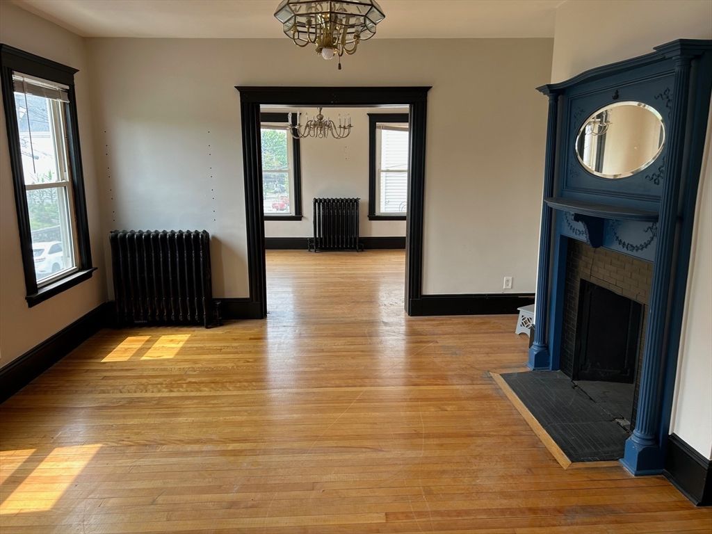 Chandelier, Empty room, Fireplace, Interior, Wood Texture Flooring