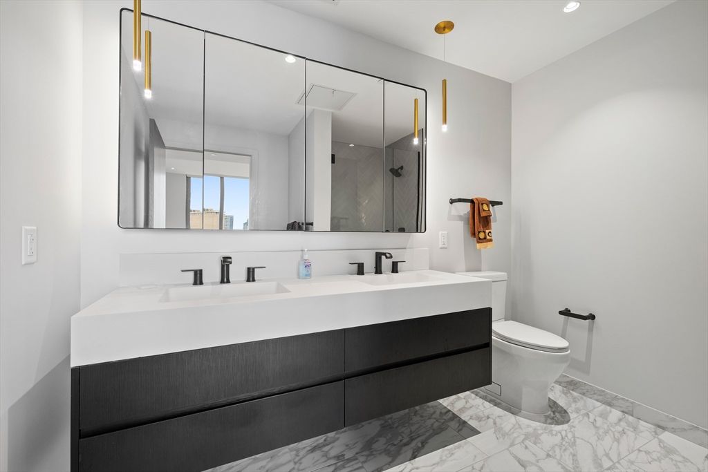 Bathroom, Dual Sink Vanities, Interior, Marble, Pendant Lights, Recessed Lighting