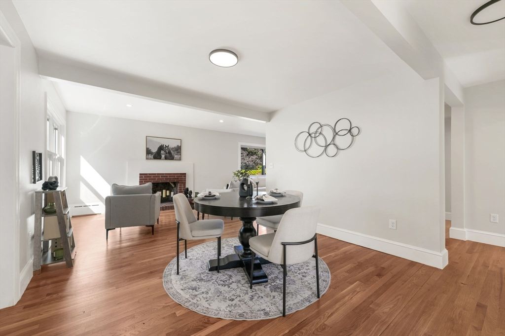 Dining room, Fireplace, Interior, Living room, Recessed Lighting, Wood Texture Flooring