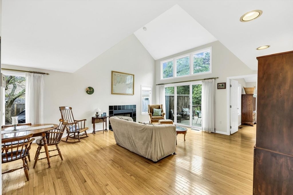Dining room, Fireplace, Interior, Living room, Recessed Lighting, Wood Texture Flooring