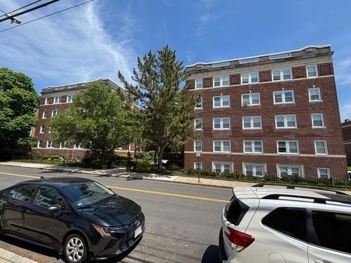 Exterior, Facade, Brick Facade, Condo Building
