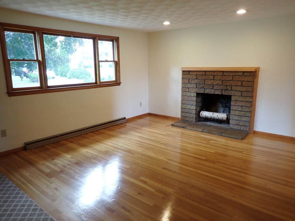Empty room, Fireplace, Interior, Recessed Lighting, Wood Texture Flooring