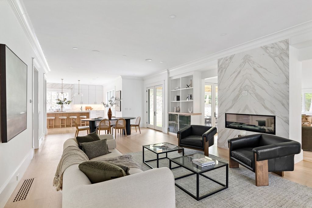 Dining room, Fireplace, Interior, Kitchen, Living room, Marble Walls, Pendant Lights, Recessed Lighting, Wood Texture Flooring