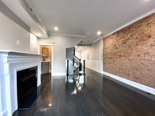 Empty room, Fireplace, Interior, Recessed Lighting, Stone Walls, Wood Texture Flooring