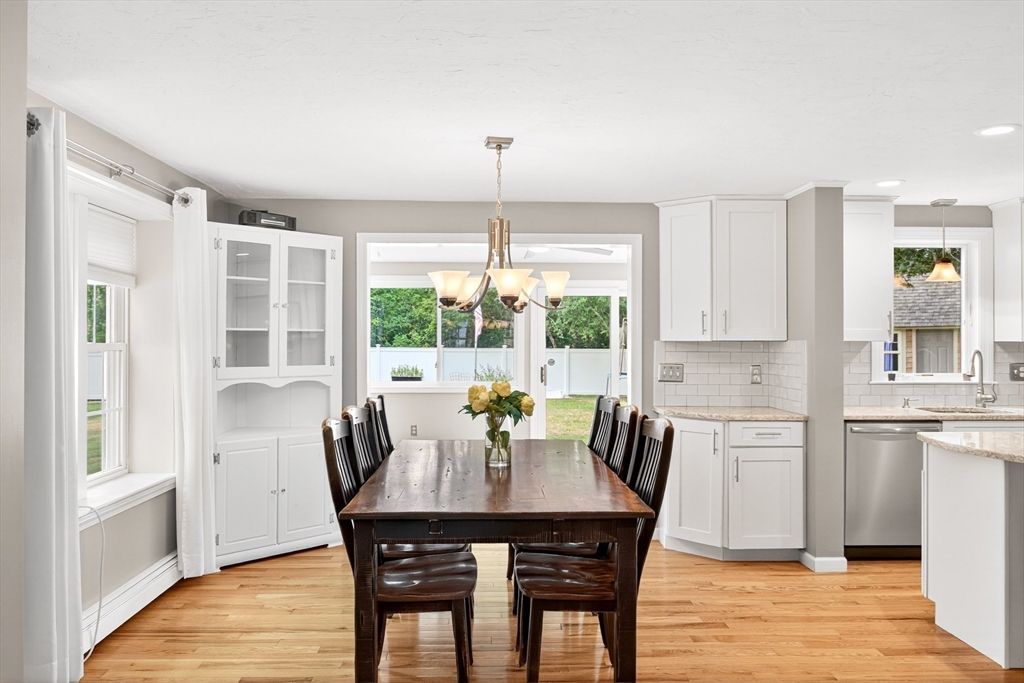 Chandelier, Dining room, Interior, Kitchen, Pendant Lights, Recessed Lighting, Stainless Steel Appliances, Wood Texture Flooring