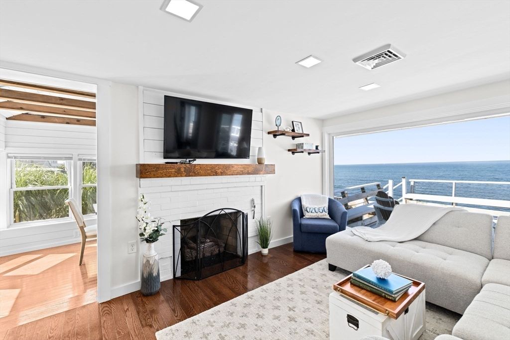 Fireplace, Interior, Living room, Recessed Lighting, Water, Wood Texture Flooring