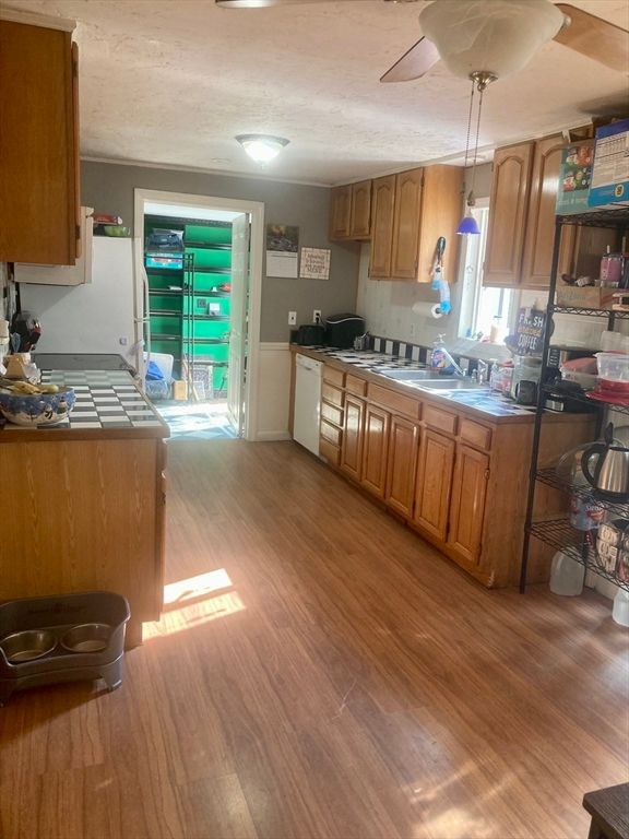 Interior, Kitchen, Pendant Lights, Tile Countertops, Wood Texture Flooring