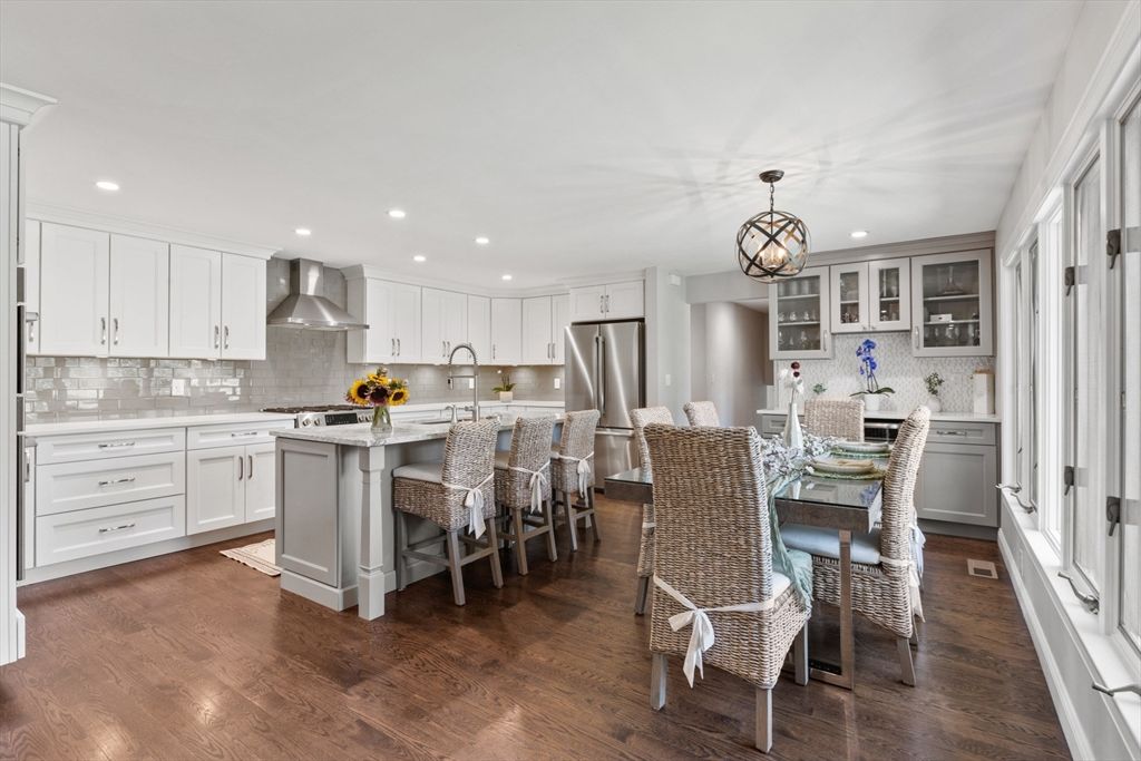 Dining room, Interior, Kitchen, Pendant Lights, Recessed Lighting, Stainless Steel Appliances, Wood Texture Flooring