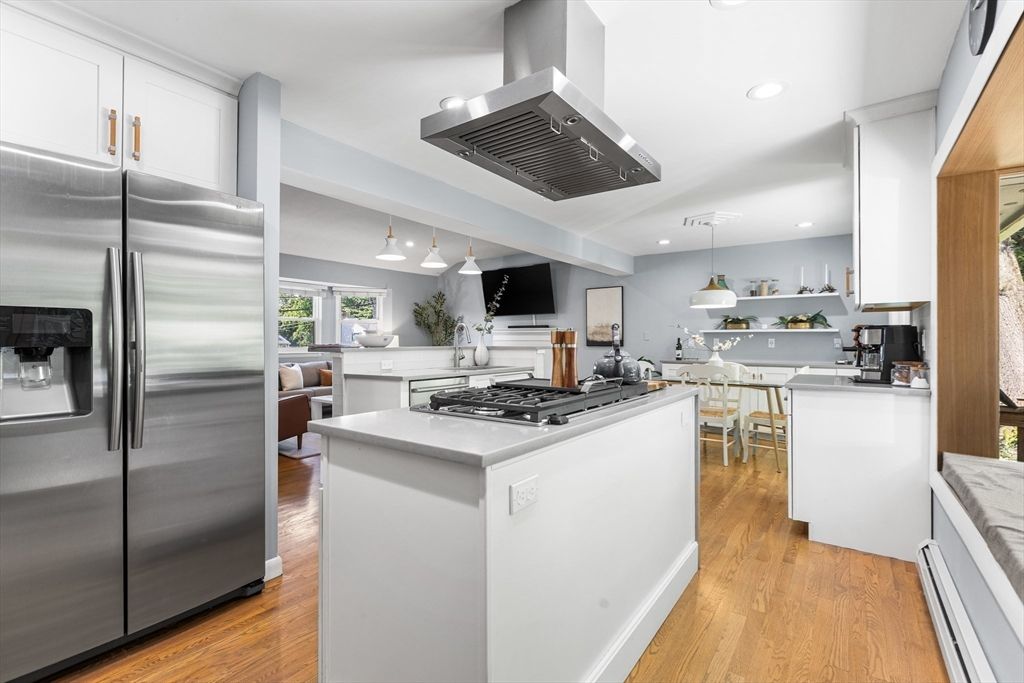 Dining room, Interior, Kitchen, Pendant Lights, Recessed Lighting, Stainless Steel Appliances, Wood Texture Flooring