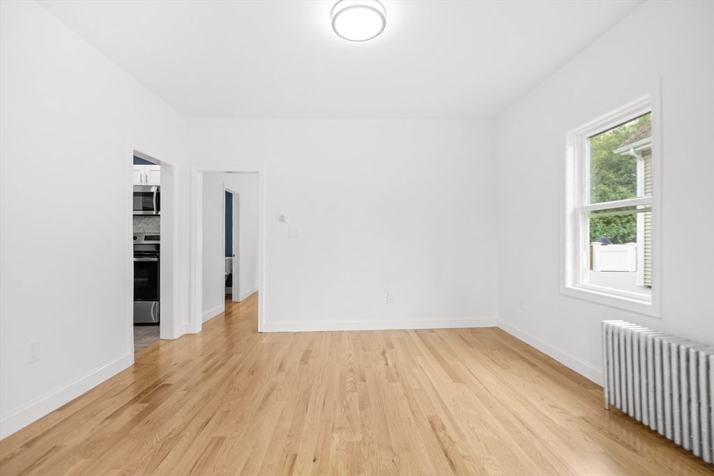 Empty room, Interior, Kitchen, Stainless Steel Appliances, Wood Texture Flooring