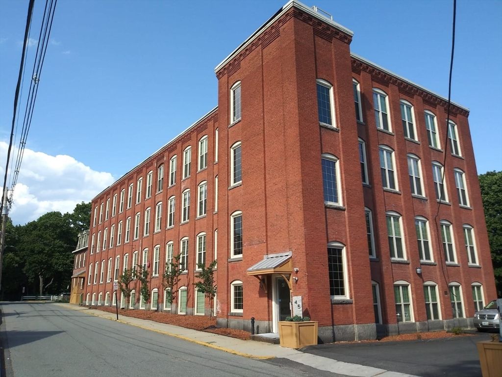 Exterior, Facade, Brick Facade, Condo Building