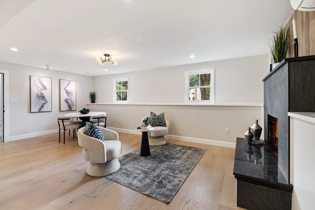 Dining room, Fireplace, Interior, Living room, Recessed Lighting, Wood Texture Flooring