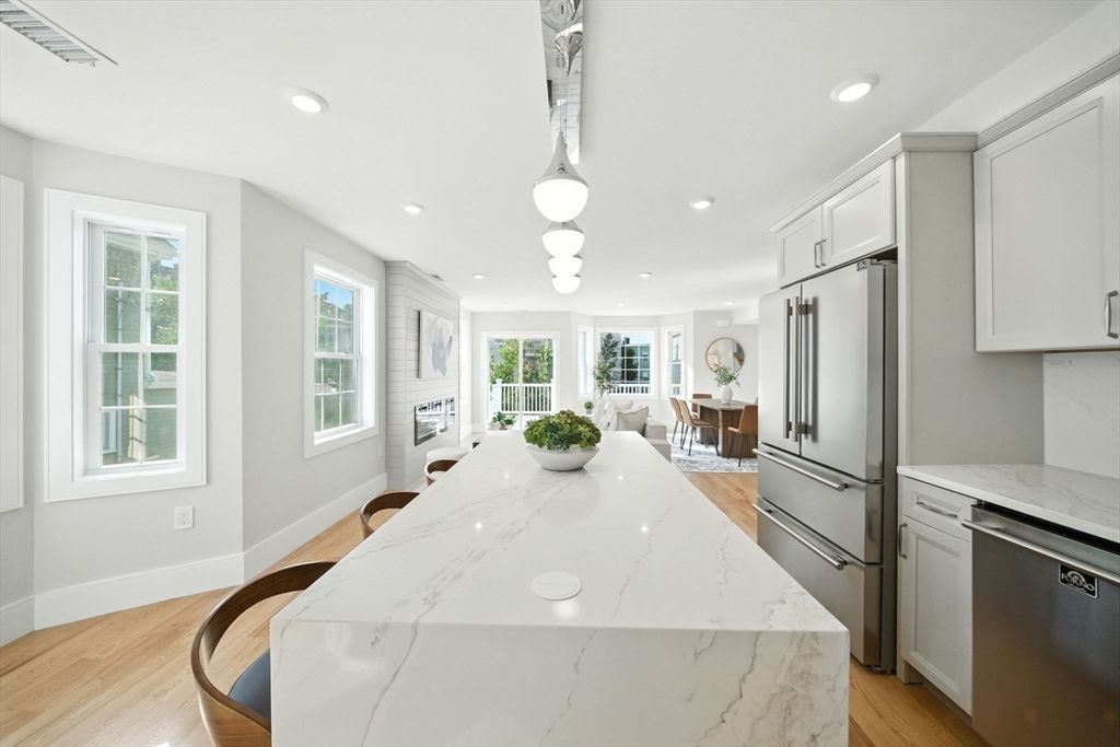 Dining room, Interior, Kitchen, Pendant Lights, Recessed Lighting, Stainless Steel Appliances, Wood Texture Flooring