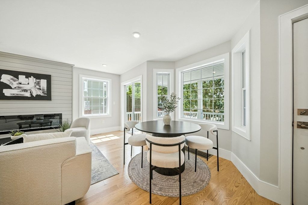 Dining room, Fireplace, Interior, Living room, Recessed Lighting, Wood Texture Flooring