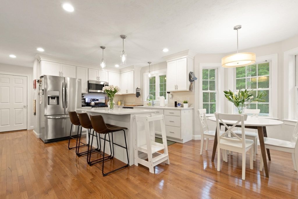 Dining room, Interior, Kitchen, Pendant Lights, Recessed Lighting, Stainless Steel Appliances, Wood Texture Flooring