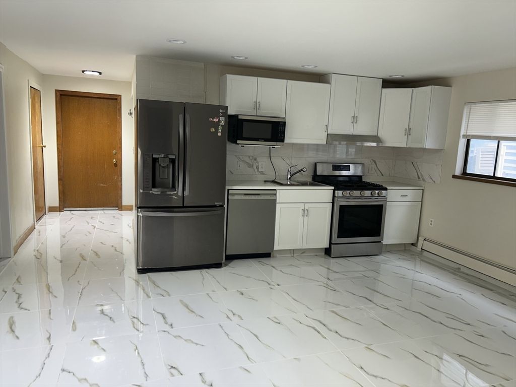 Interior, Kitchen, Marble, Marble Walls, Recessed Lighting, Stainless Steel Appliances