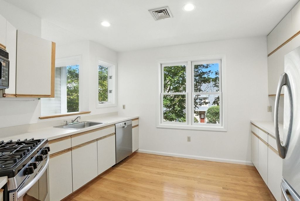 Interior, Kitchen, Recessed Lighting, Stainless Steel Appliances, Wood Texture Flooring