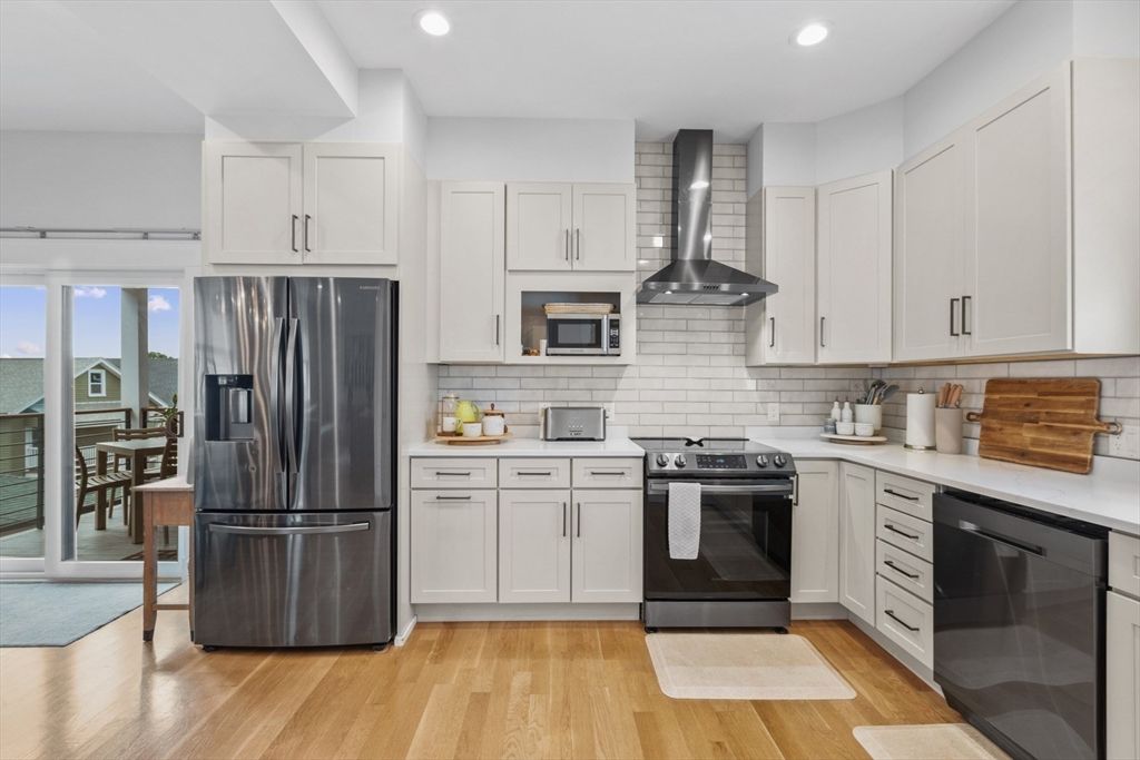 Dining room, Interior, Kitchen, Recessed Lighting, Stainless Steel Appliances, Water, Wood Texture Flooring