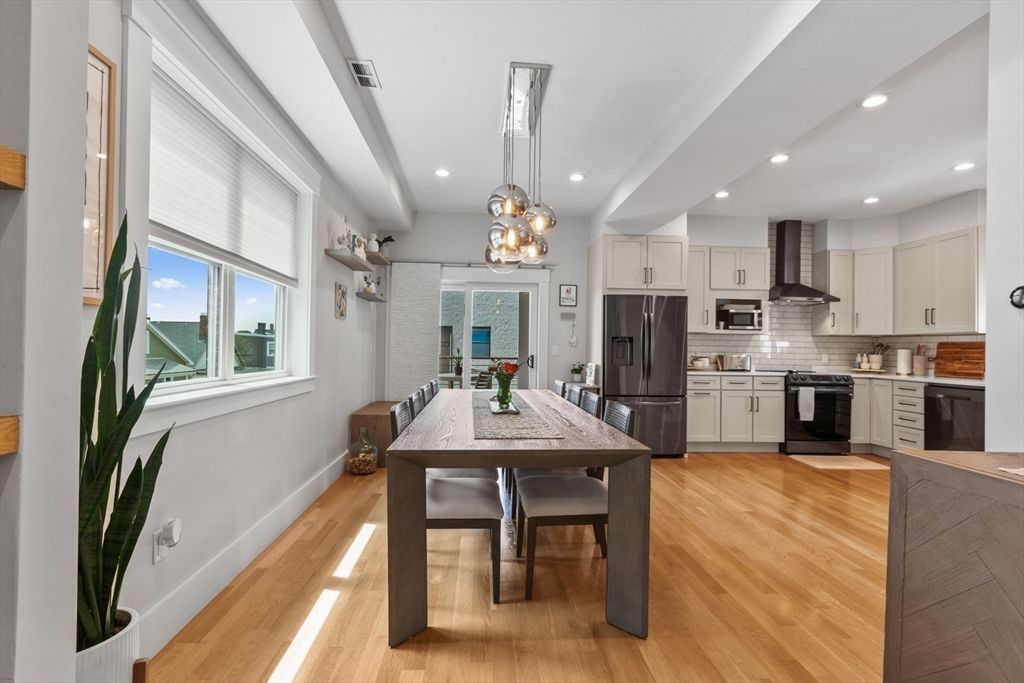 Dining room, Interior, Kitchen, Pendant Lights, Recessed Lighting, Stainless Steel Appliances, Wood Texture Flooring
