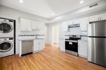 Interior, Kitchen, Recessed Lighting, Stainless Steel Appliances, Washer, Wood Texture Flooring