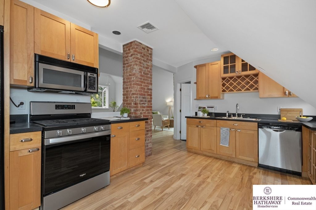 Interior, Kitchen, Recessed Lighting, Stainless Steel Appliances, Stone Walls, Wood Texture Flooring
