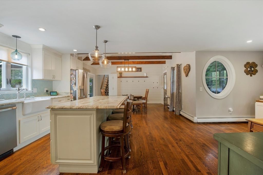 Dining room, Interior, Kitchen, Living room, Pendant Lights, Recessed Lighting, Stainless Steel Appliances, Wooden Beams, Wood Texture Flooring