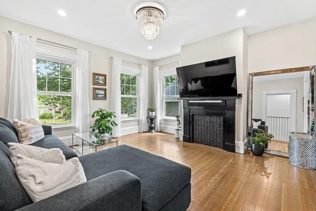 Chandelier, Fireplace, Interior, Living room, Recessed Lighting, Wood Texture Flooring