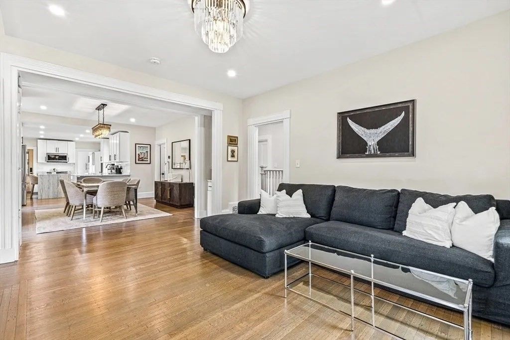 Chandelier, Dining room, Interior, Kitchen, Living room, Pendant Lights, Recessed Lighting, Stainless Steel Appliances, Wood Texture Flooring