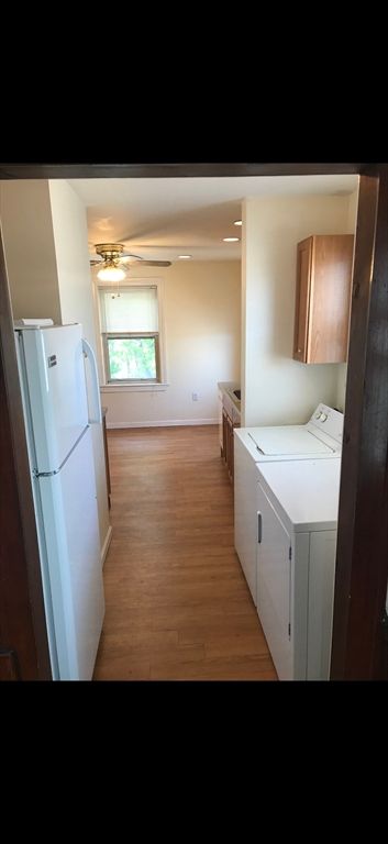 Interior, Kitchen, Recessed Lighting, Washer, Wood Texture Flooring