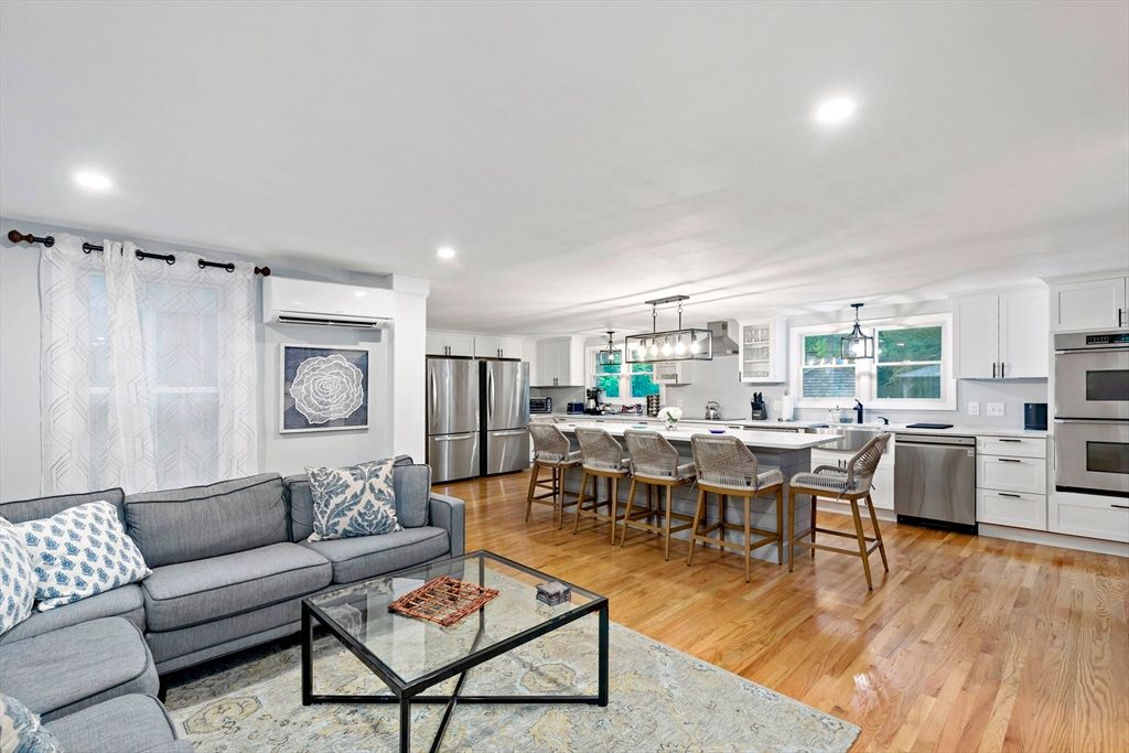 Dining room, Interior, Kitchen, Living room, Pendant Lights, Recessed Lighting, Stainless Steel Appliances, Wood Texture Flooring