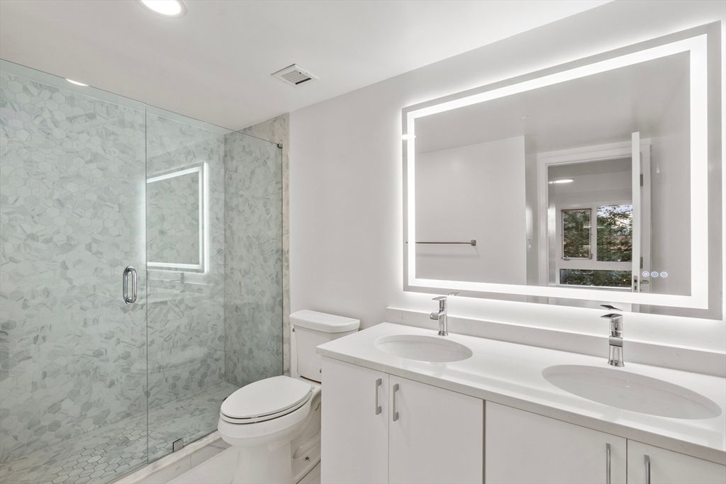 Bathroom, Dual Sink Vanities, Glass Shower, Interior, Marble Walls, Recessed Lighting