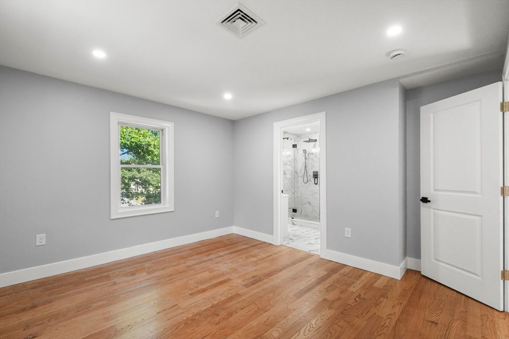 Bathroom, Empty room, Glass Shower, Interior, Marble, Marble Walls, Recessed Lighting, Wood Texture Flooring
