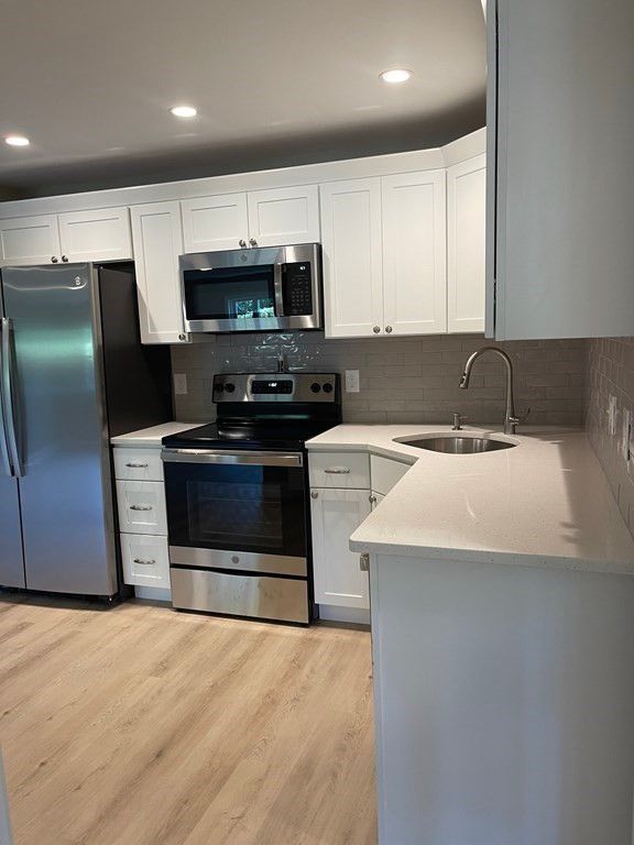 Interior, Kitchen, Recessed Lighting, Stainless Steel Appliances, Wood Texture Flooring
