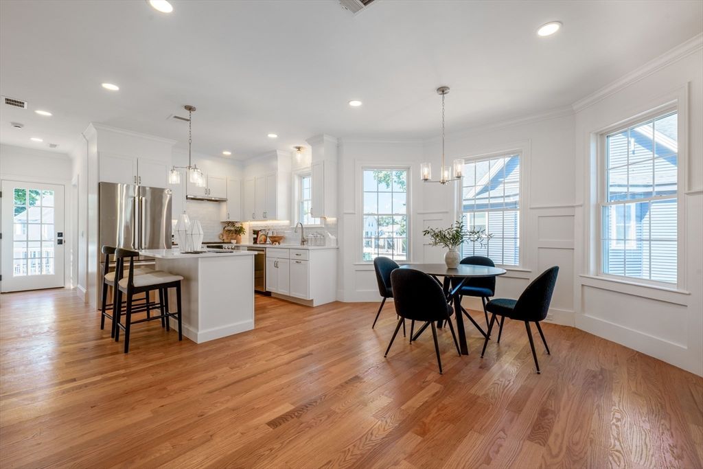 Dining room, Interior, Kitchen, Pendant Lights, Recessed Lighting, Stainless Steel Appliances, Wood Texture Flooring
