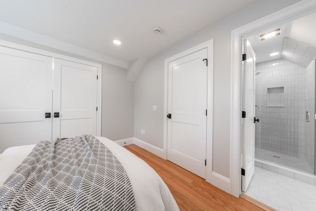 Bathroom, Bedroom, Glass Shower, Interior, Recessed Lighting, Wood Texture Flooring