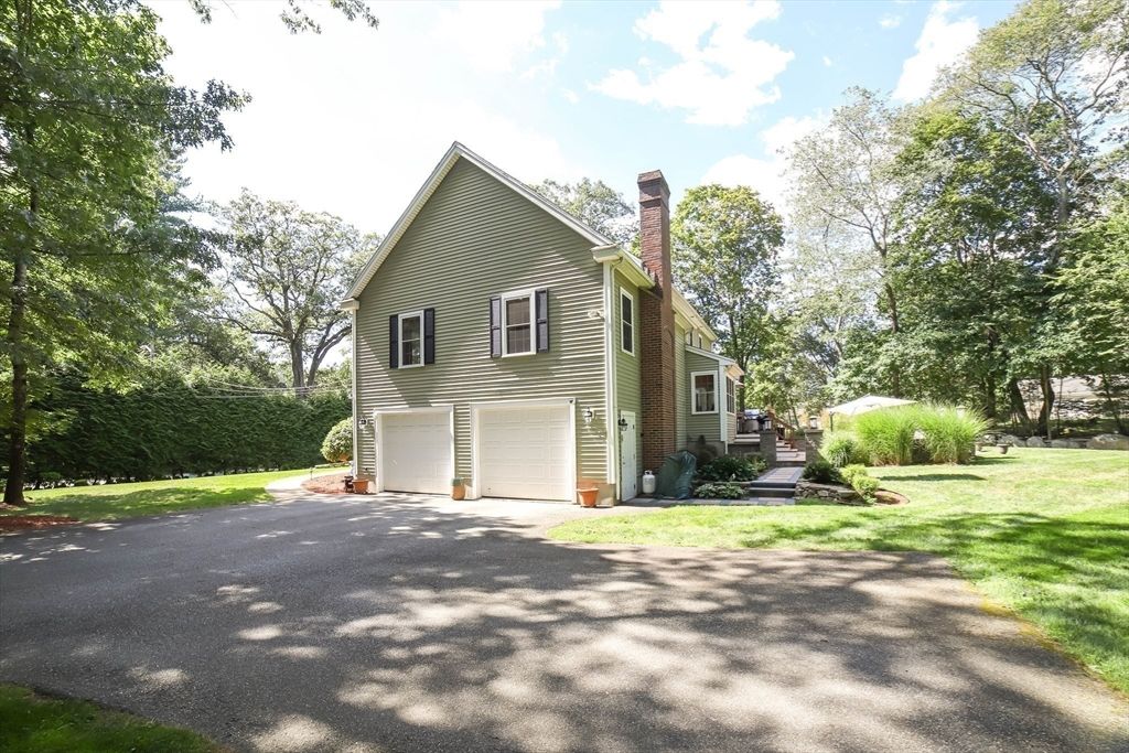 Attached, Backyard, Exterior, Facade, Brick Facade, Raised Ranch