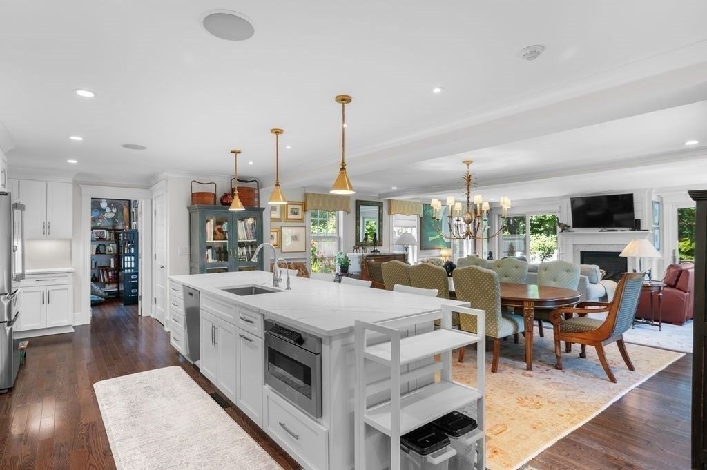 Chandelier, Dining room, Fireplace, Interior, Kitchen, Living room, Pendant Lights, Recessed Lighting, Wood Texture Flooring